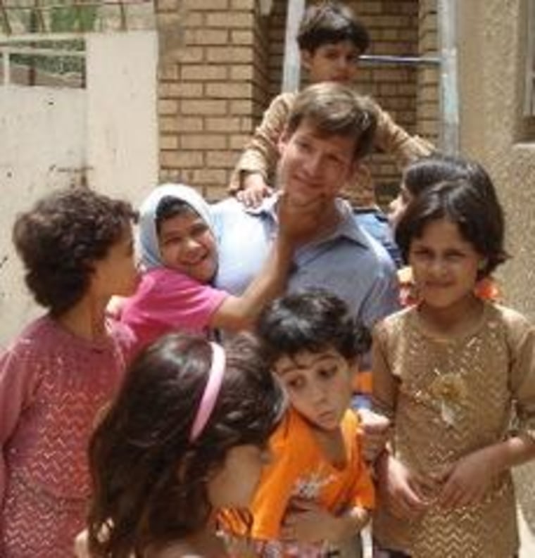 Richard Engel with some of the children at the orphanage.